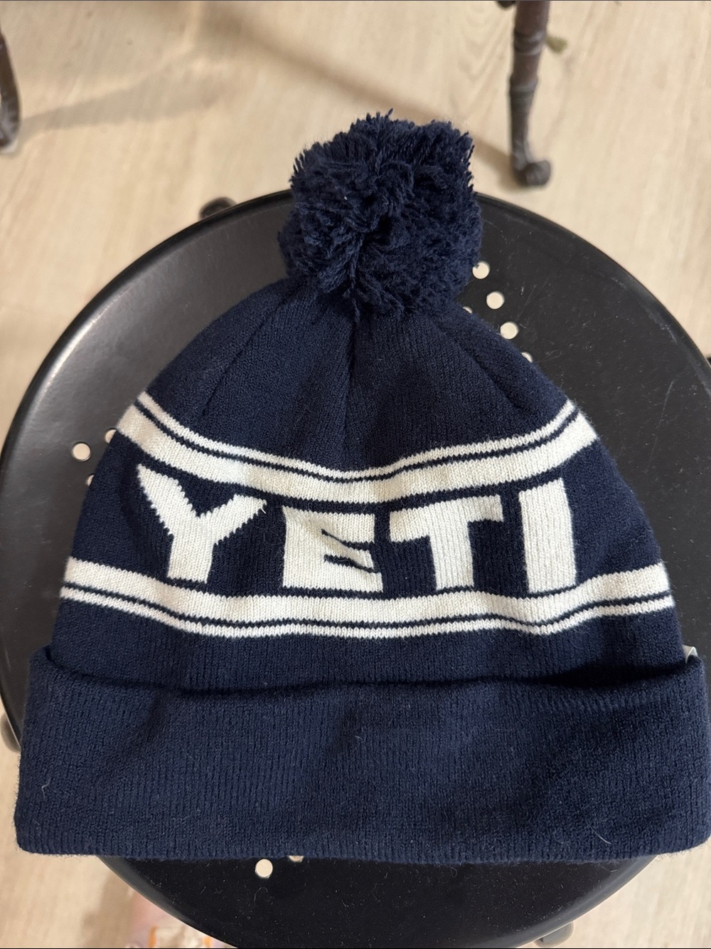 Yeti Navy and White Pom Beanie